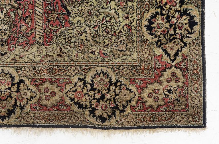 A semi-antique silk Quum, c. 216 x 141 cm.