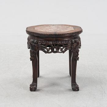 A Chinese hardwood stool, 20th Century.