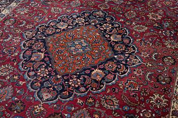 A semi-antique Mashad carpet, Eastern Iran, signed c. 507 x 303 cm.