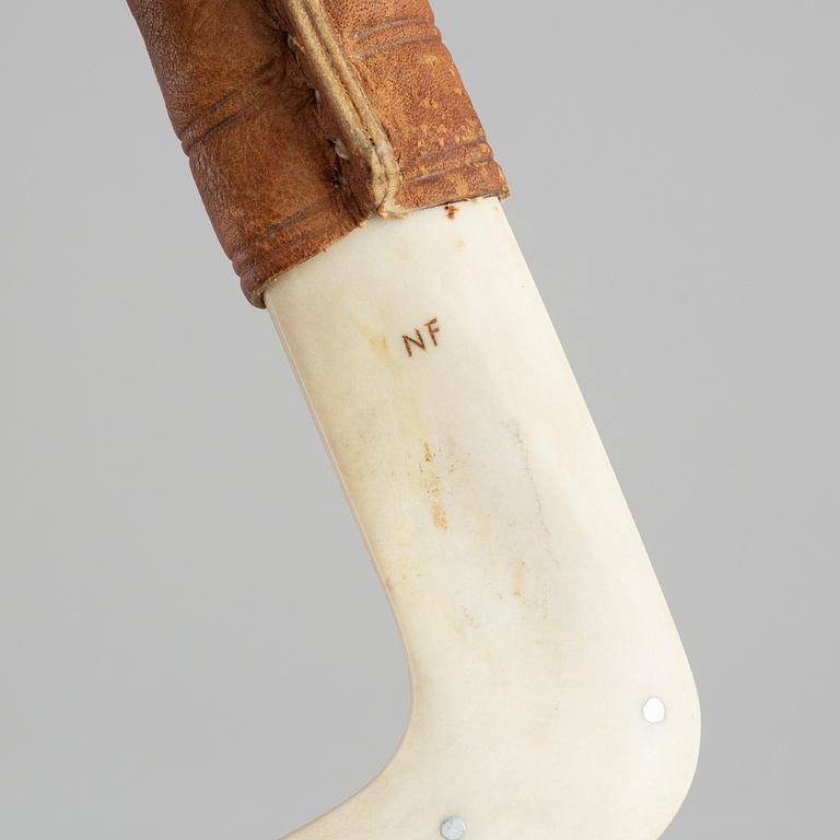 Nikolaus Fankki, a reindeer horn Sami knife, signed.