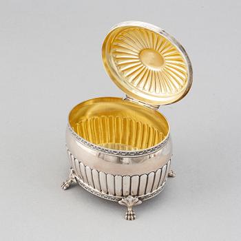 A silver creamer by Johan Petter Ahlforss, Strängnäs, 1833 and a silver sugar box, Kristianstad, 1928.