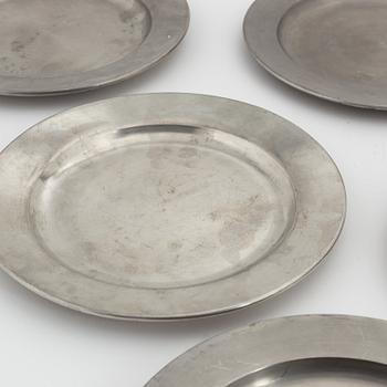 A set of six pewter plates from Firma Svenskt Tenn, including Stockholm 1968.