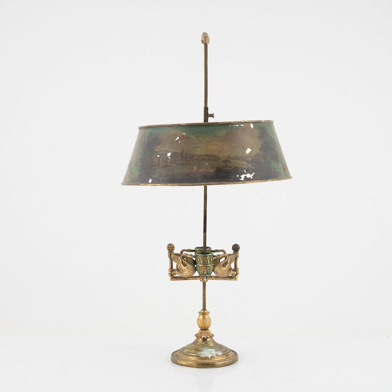 An Empire gilt bronze and tôle-peinte two-light reading lamp, early 19th century.