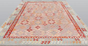 A kilim carpet, c 342 x 255 cm.