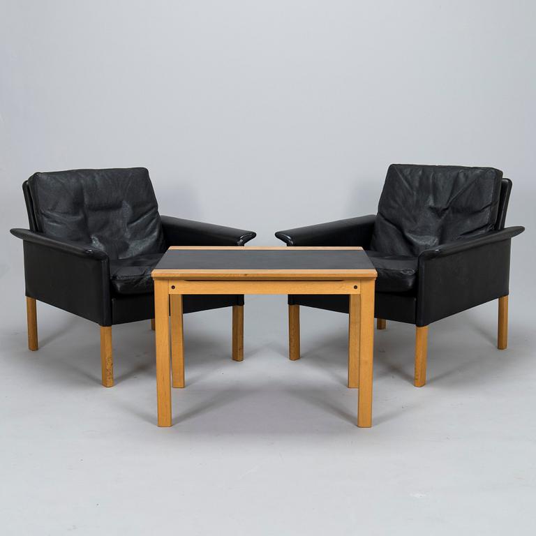 Hans Olsen, a pair of 1960s armchairs and a table, Denmark.