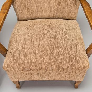 A pair of 1930/1940's open armchairs so called 'K-chair'.