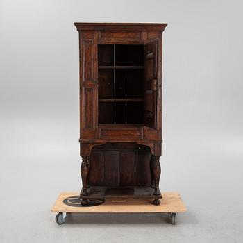A Baroque cabinet on a later stand, early 18th Century.