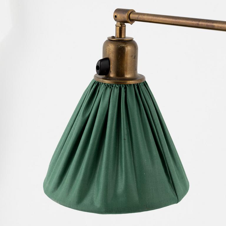 Josef Frank,  a wall/ bed light, brass,  Firma Svenskt Tenn.