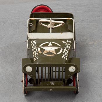 A sheet metal pedal car from the second half of the 20th century.