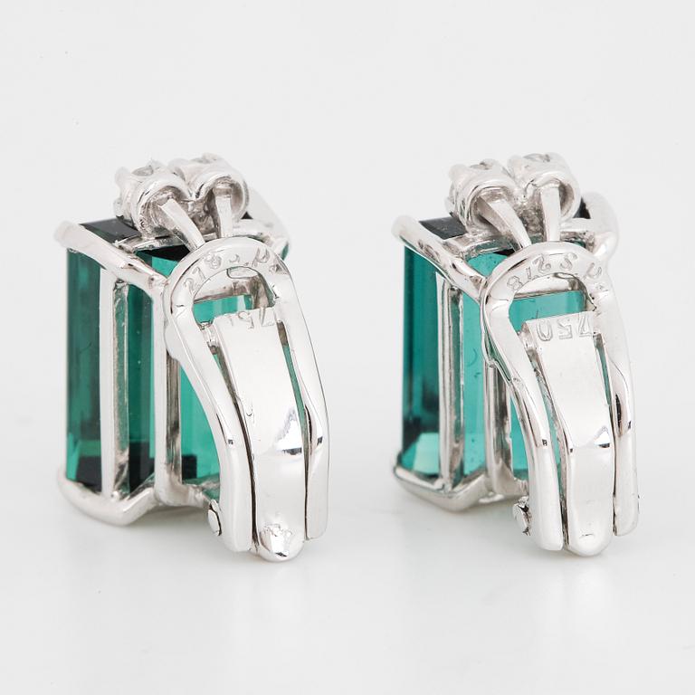 Earrings with green tourmalines and eight-cut diamonds.