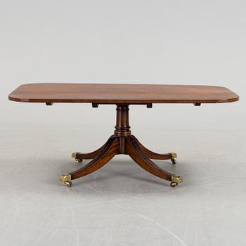 A SOFA TABLE, probably England, second half of the 20th century.