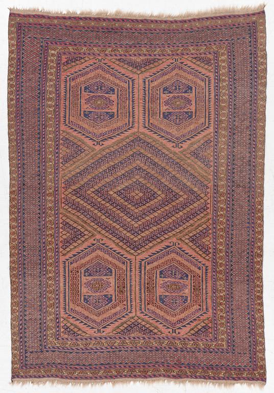 An oriental rug, a. 198 x 130 cm.