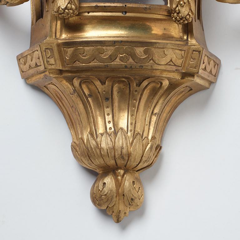 A Louis XVI gilt bronze wall clock by Jean Joseph Léonard Roque, active 1770-89.