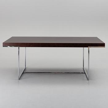 A "Athos" dining table by Paolo Piva for B&B Italia.