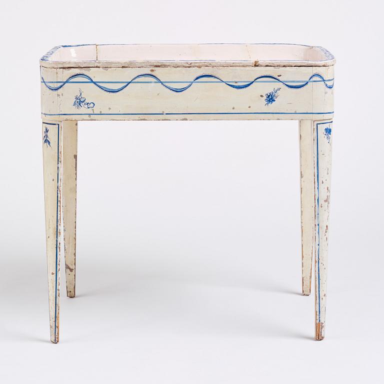 A blue and white faience tea table, second part of the 18th century.