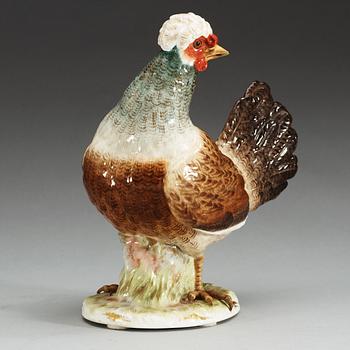 A Meissen figure of a hen with an egg, 19th Century.