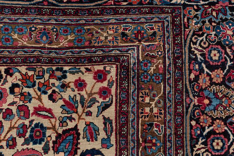 A carpet, semi-antique, Mashad/Moud, ca 431 x 324 cm.