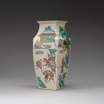 A figural famille rose vase, Qing dynasty, 19th century.