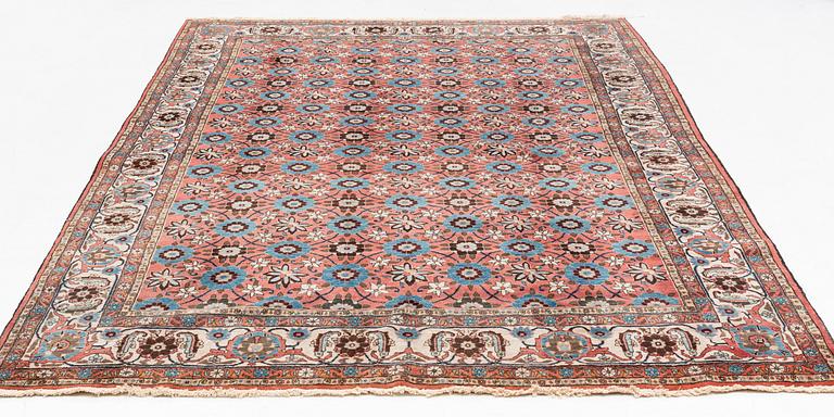 A semi-antique Veramin carpet, ca 338 x 212 cm.