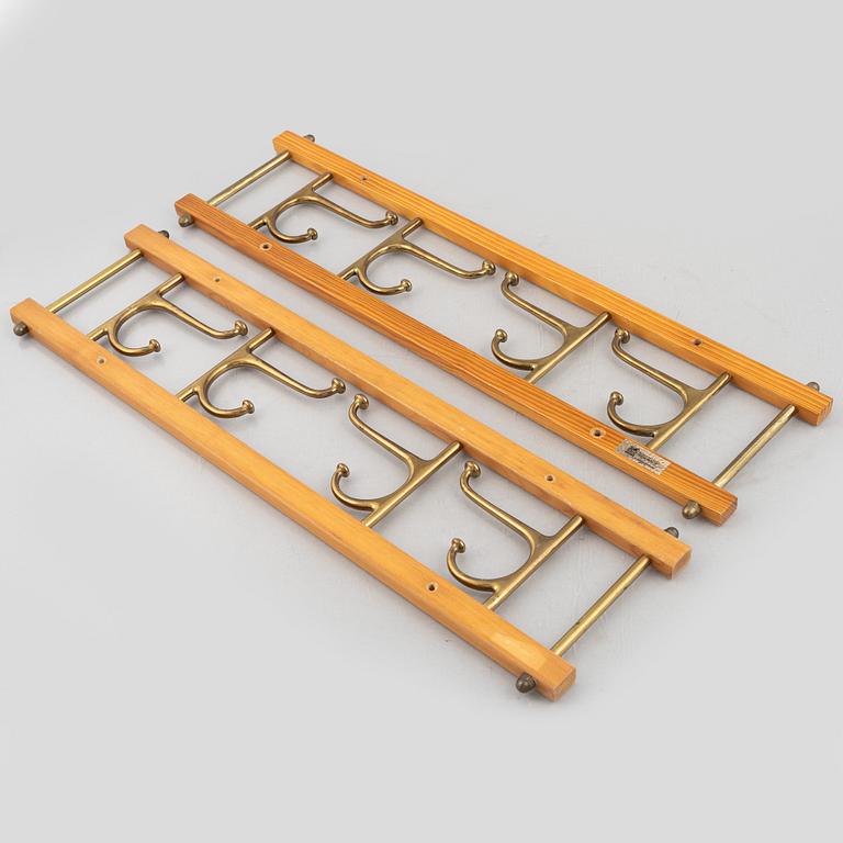 A pair of 'Dekorativ' coat hangers, Skoglunds metallgjuteri, Anderstorp, 1950's/60's.