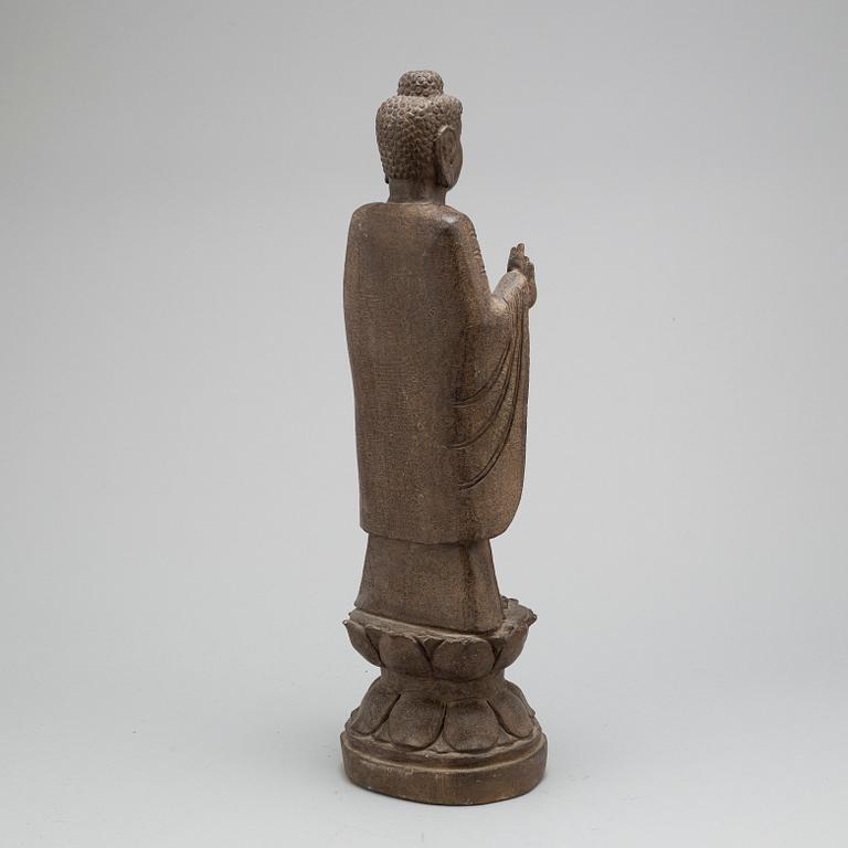 A stone sculpture of buddha,  South East Asia, 20th Century.