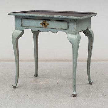 a 1800's rococo table.