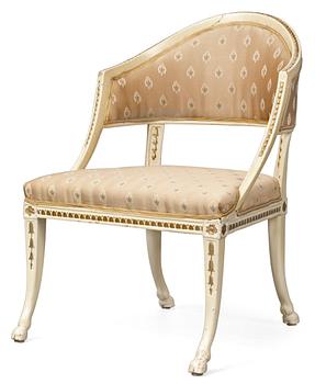 873. A late Gustavian armchair in the manner of E. Ståhl.
