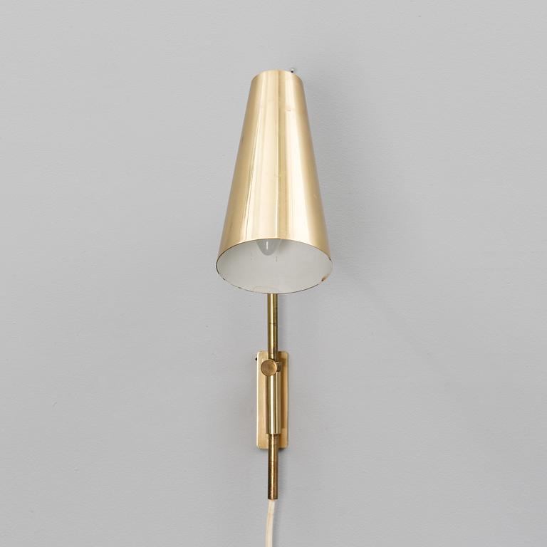 A wall light manufactured by Taito.