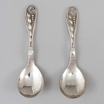 GEORG JENSEN, a pair of silver spoons, mid 20th century.