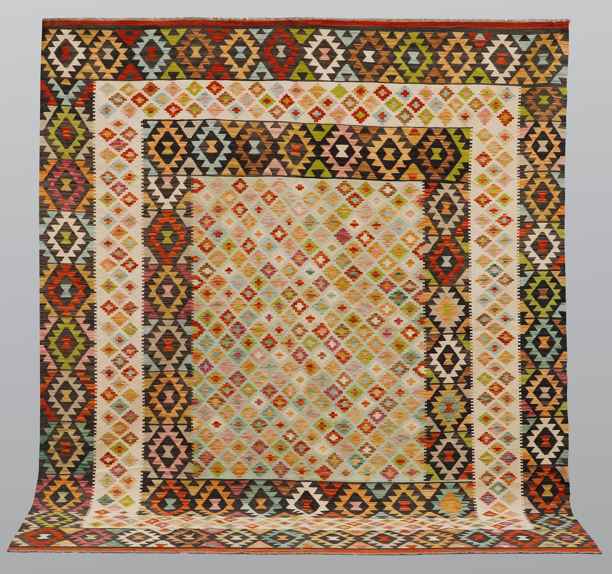 A carpet, Kilim, ca 304 x 263 cm.