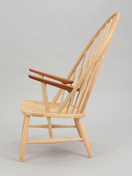 A Hans J Wegner ash and teak 'Peacock chair', by PP Møbler, Denmark.