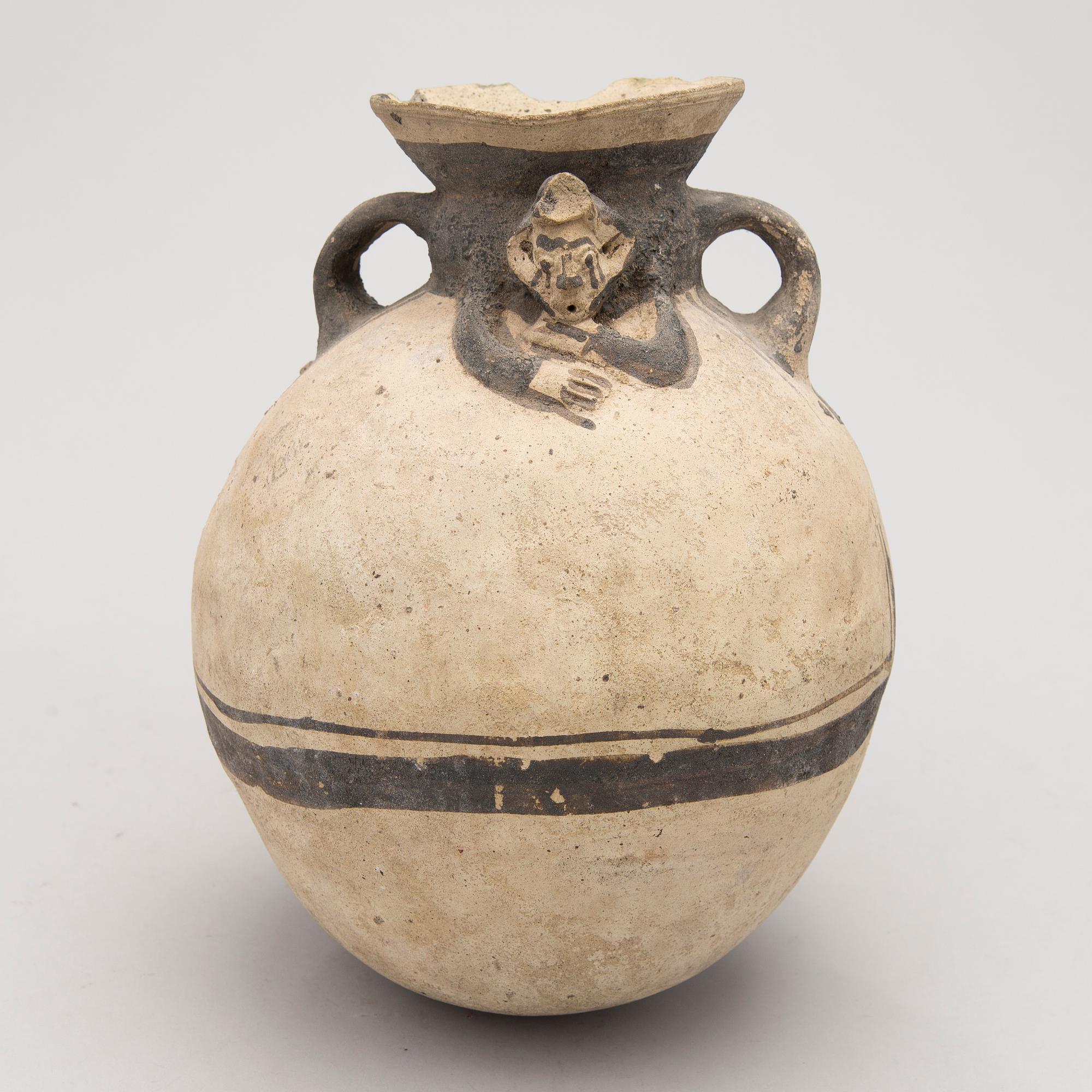 An earthenware 1200-1450 AD Central Peru pot. Chancay culture.