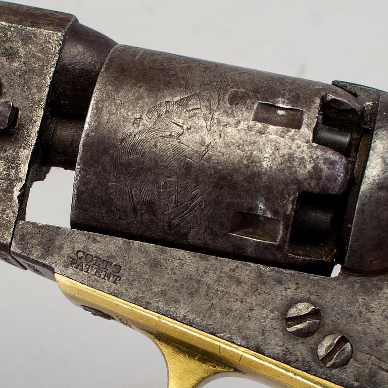 A Colt percussion revolver mid 19th century.