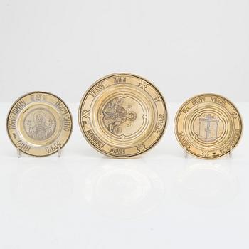 Three 19th-century gilt silver paten, two by master Dmitry Maksimovich Shelaputin, Moscow, 1876-77.