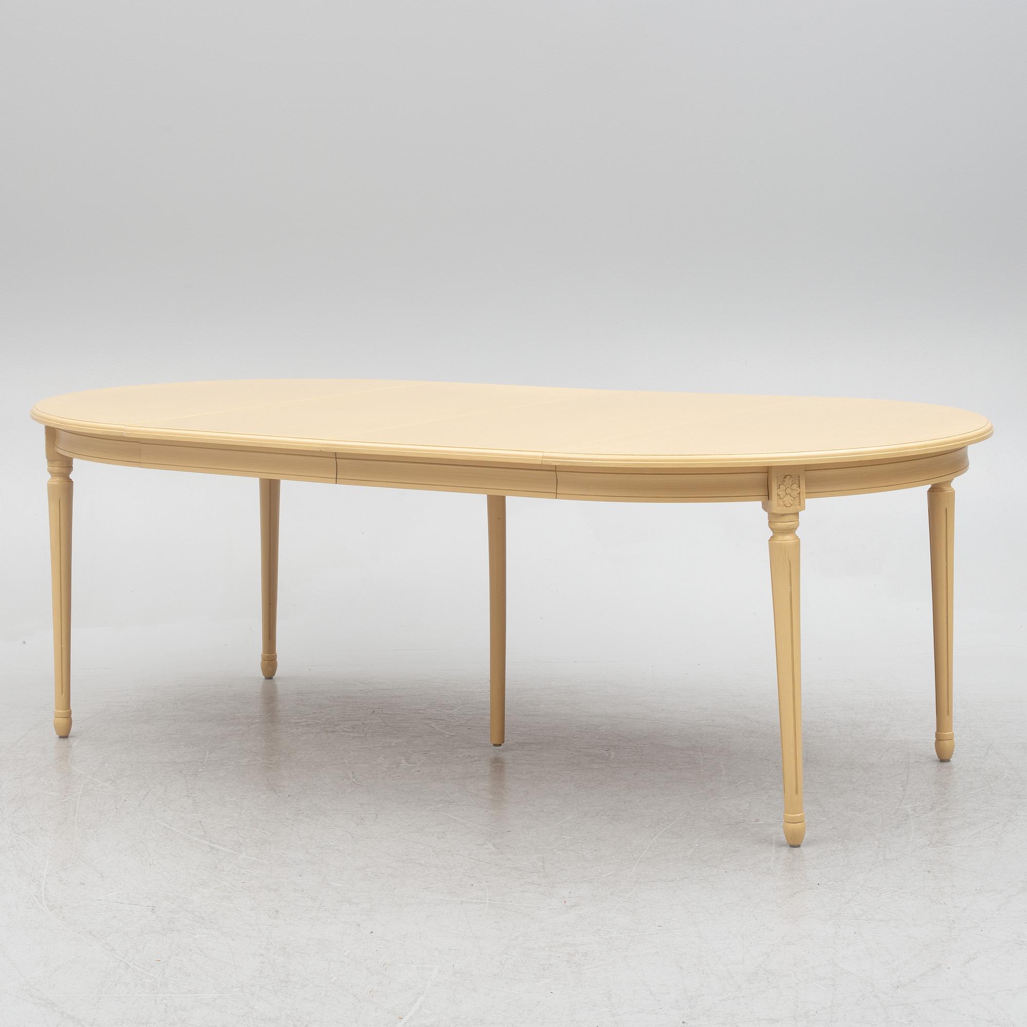 A Gustavian style dining table with six dining chairs, Sweden, 21st century.