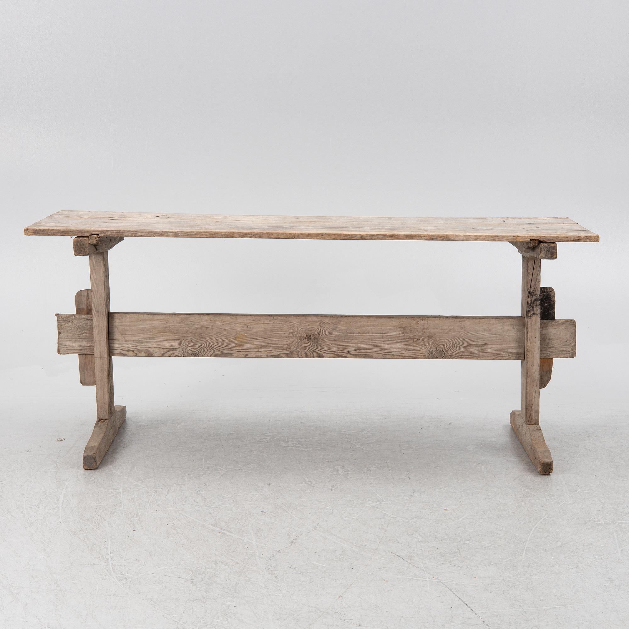 A wooden table, circa 1900.