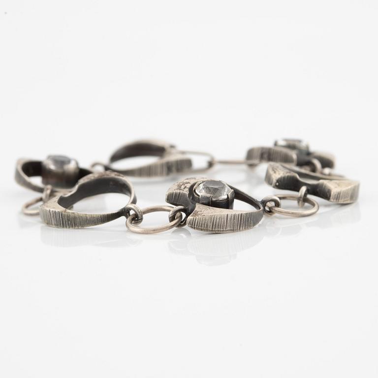 Karl Laine, ring, pendant, and bracelet, silver with rock crystal.