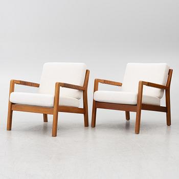 Carl Gustaf Hiort af Ornäs, a matched pair of 'Rialto' lounge chairs, Puunveisto Oy - Träsnideri Ab, Finland, mid-20th century.
