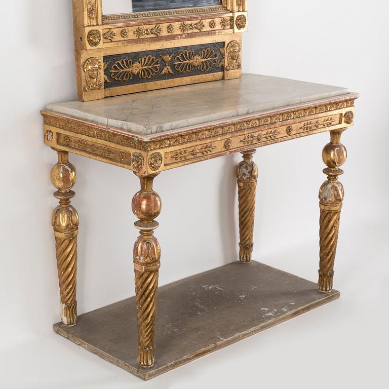 A gilt mirror dated 1816 by CM Fogelgren, linköping with a console table.