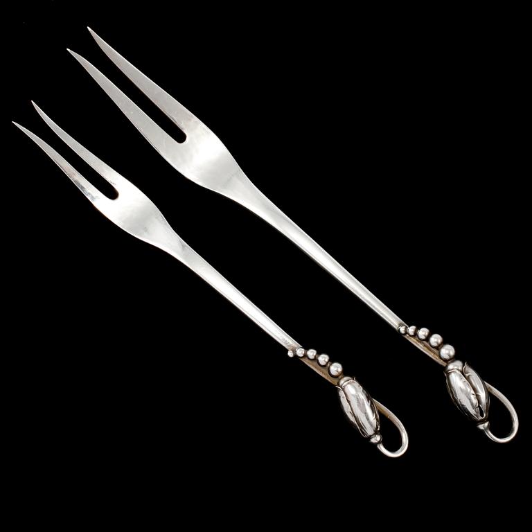 SERVERINGSBESTICK, 2 st, sterlingsilver, "Magnolia/Blossom", Georg Jensen, Danmark. Vikt 40 g.