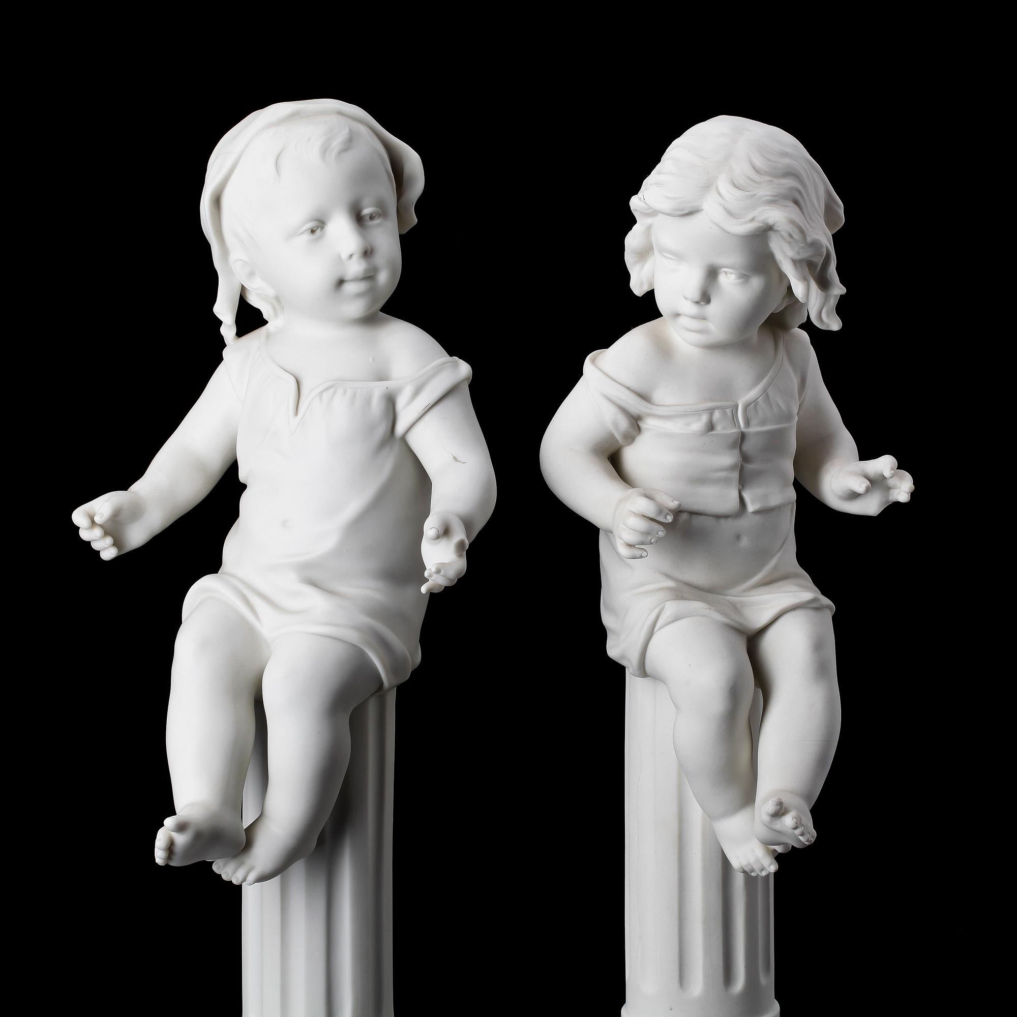 SKULPTURER, ett par, parian, Gustafsberg 1904 resp 1920.