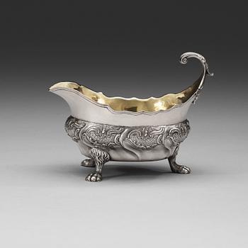 A Swedish mid 18th century parcel-gilt sauce-boat, marks of Kilian Kelson, Stockholm 1755.