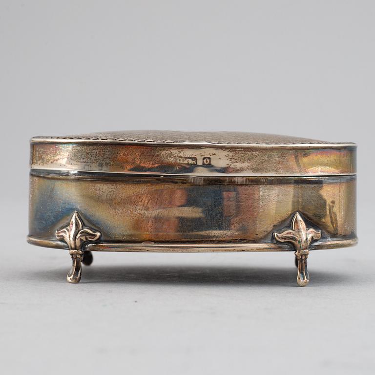 7 silver boxes.