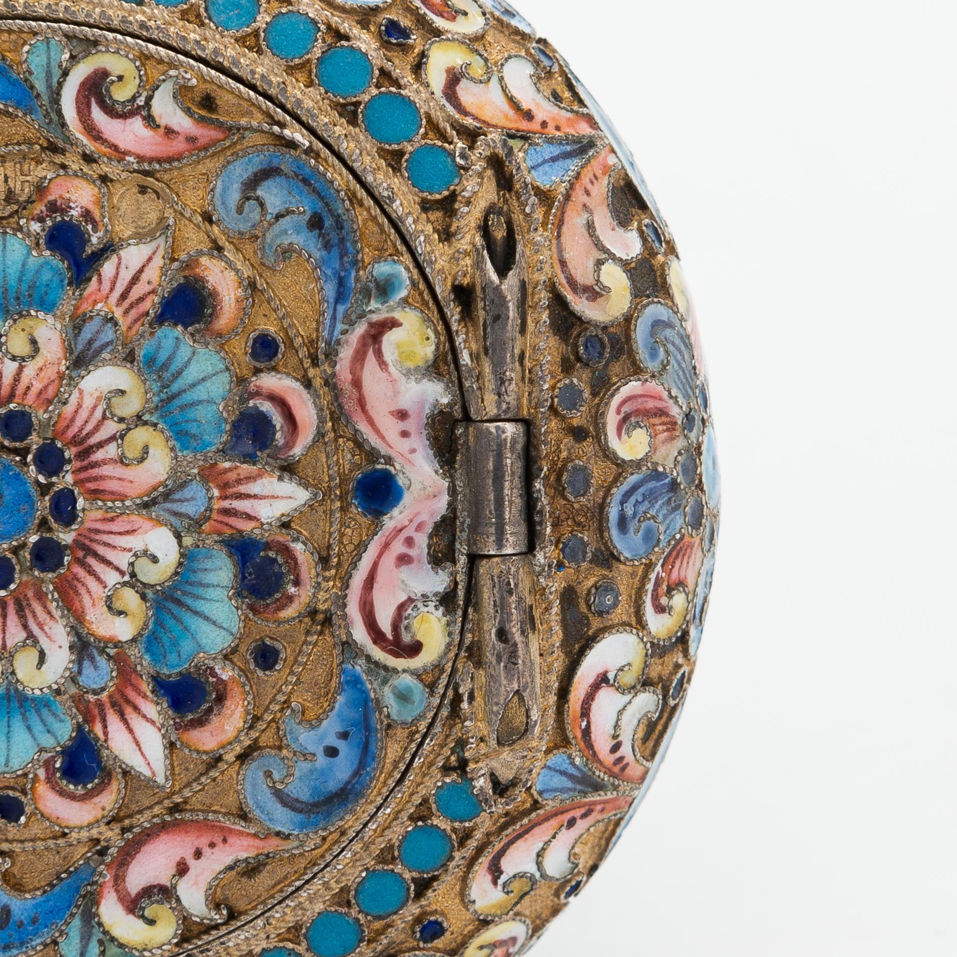 A gilt silver cloisonné enamel pill box, maker's mark of D. Nikitin, Moscow 1908-17.