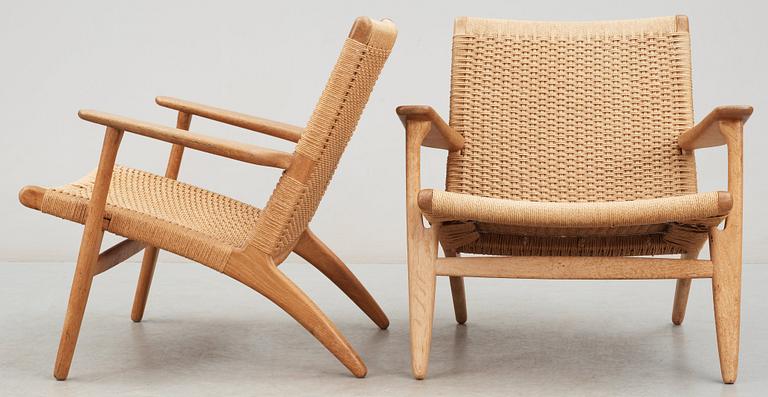 Two Hans J Wegner oak easy chairs, 'CH-25' Carl Hansen & Son, Denmark.