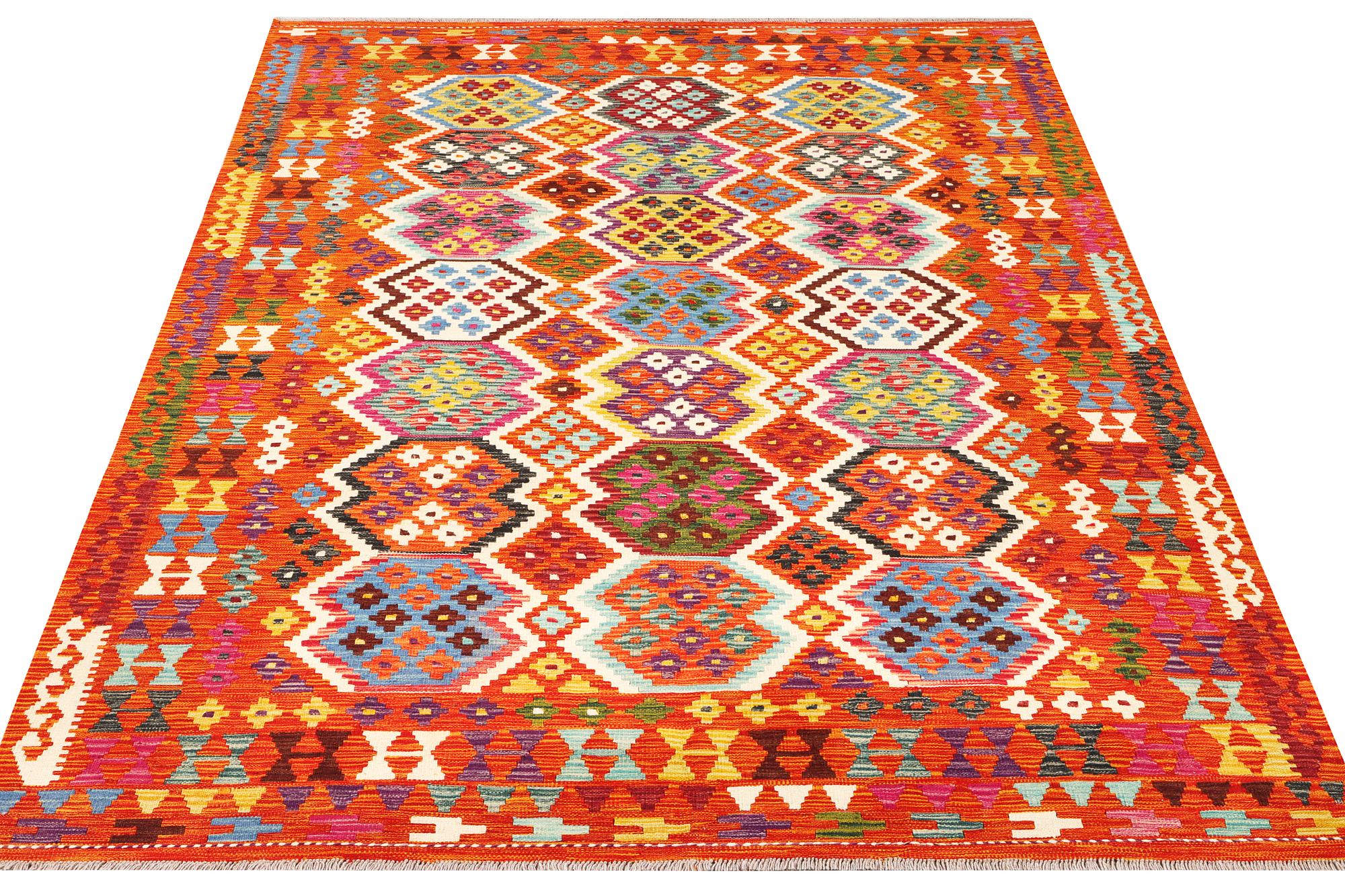 An Afghan kilim rug, c. 290 x 203 cm.