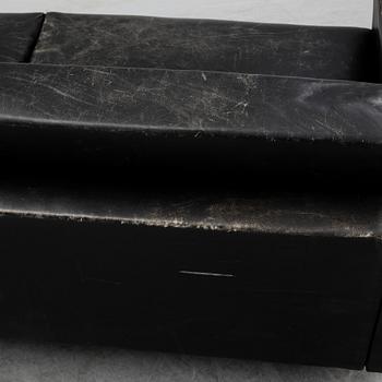 A 1960's leather covered sofa.