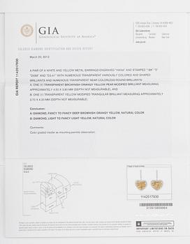 ÖRHÄNGEN, 1 par, 18 k vitguld, olikslipade bla briljantslipade diamanter tot ca 7.80 ct. Certifikat GIA.