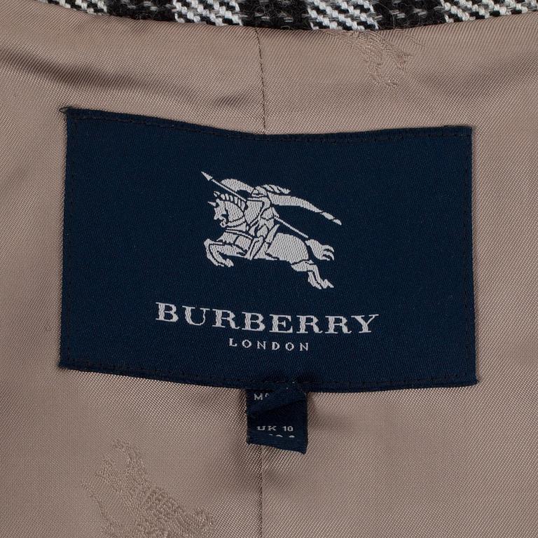 BURBERRY, a wool trenchcoat.