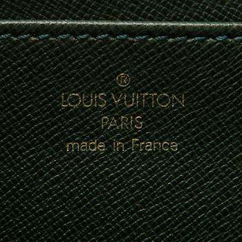 A Green Taiga Leather Serviette Laguito Briefcase.